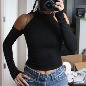 Cold shoulder turtleneck.